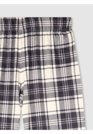 Pantaloni a quadri in crema, nero e viola. Presentano un elastico in vita e una consistenza morbida. Motivo a scacchi prominente su tutta la superficie.