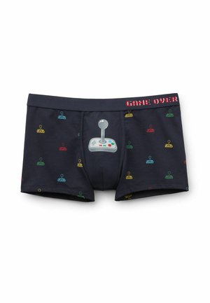 Black cotton boxer shorts featuring colorful joystick graphics, a prominent game controller print, and "GAME OVER" text on the waistband.