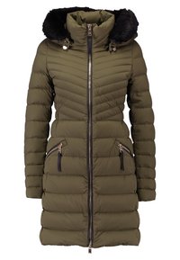 Dlouhý olivově zelený prošívaný zimní kabát s černým umělým kožešinovým lemováním kapuce, předním zipem a dvěma kapsami na zip.