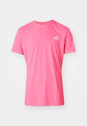 Pink short-sleeve t-shirt with a crew neck, made from soft material, featuring a subtle texture and a small white Adidas logo on the chest.