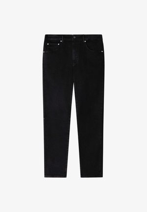 Crne traperice ravnog kroja, s prednjim džepovima, patentnim zatvaračem i kopčanjem na gumbe. Glatka tekstura s minimalnim vidljivim šavovima.