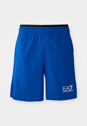 Blue athletic shorts with an elastic waistband, featuring a white logo on the left. Made of lightweight fabric, smooth texture.