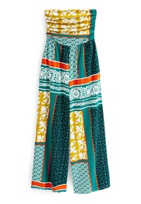 Mono sin tirantes con corpete fruncido, con un diseño de patchwork en patrones florales verdes, amarillos y blancos, con acentos naranjas.