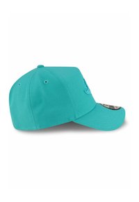 Turquoise baseball cap with a curved visor, featuring a stitched logo on the front and ventilation holes on the sides. Textured fabric.