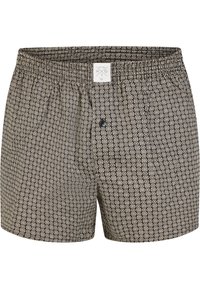 Boxer con motivo in marrone scuro e disegni geometrici bianchi. Presentano un elastico in vita e un bottone frontale per la chiusura.