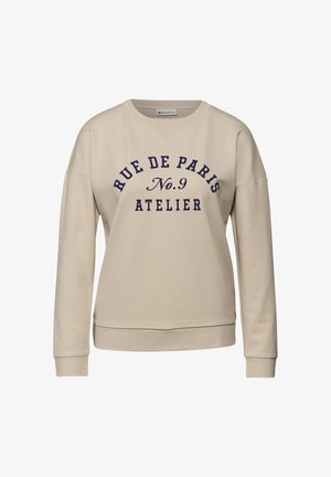 Beżowa bluza z okrągłym dekoltem, długimi rękawami i granatowym napisem "RUE DE PARIS No.9 ATELIER." Gładka faktura i luźny krój.