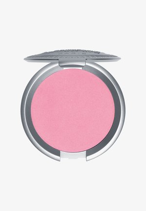 Round silver compact with an open lid reveals smooth pink powder makeup inside.
