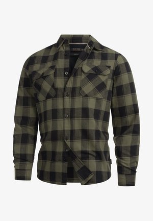 Zelená a čierna kockovaná flanelová košeľa s zapínaním na gombíky vpredu, dvoma náprsnými vreckami a dlhými rukávmi. Mäkká textúra, rovný strih a klasický golier.