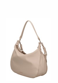 Beige leren schoudertas met een ronde vorm, verstelbare riem en ritsdetails. Glad oppervlak met subtiele merkopdruk aan de voorkant.