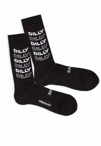 Schwarze Baumwollsocken mit rundem Schnitt, die auf den Sohlen wiederholt weißen Text mit "DILLY" und "DILLY SOCKS" zeigen. Rippstruktur im Schaftbereich.