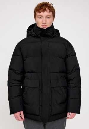 Black puffer jacket with a hood, featuring quilted sections and front pockets, made from smooth, water-resistant fabric.