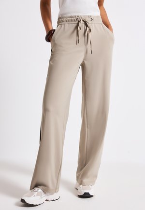 MIT GALLONSTREIFEN - Tracksuit bottoms - beige