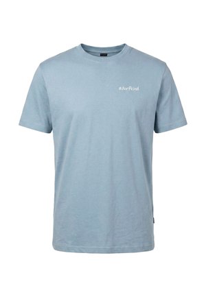 T-shirt bleu clair à manches courtes avec col rond et texte blanc "#dorfkind" sur le côté gauche de la poitrine.