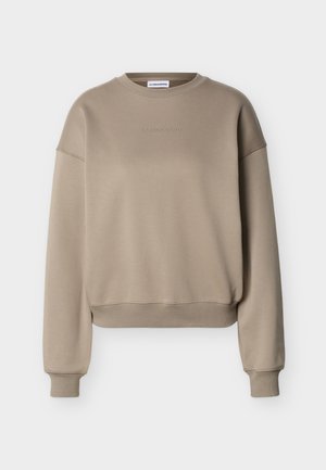 Μπέζ φούτερ με μακριά μανίκια και στρογγυλή λαιμόκοψη, με ριμπ μανσέτες και τελείωμα, που διαθέτει διακριτικό ανάγλυφο λογότυπο "J.Lindeberg" στο στήθος.