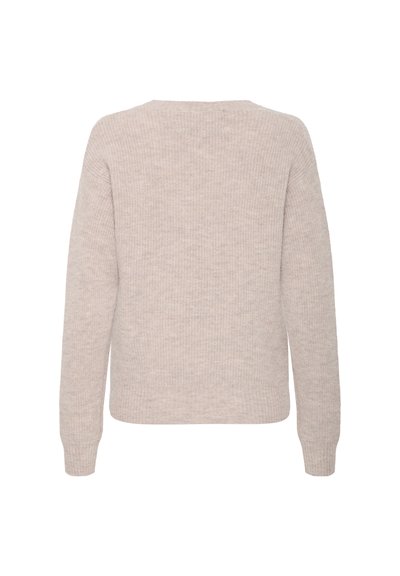 Bežinė megzta sv.getė su laisvu pritaikymu, apvaliu iškirpimu ir ilgomis rankovėmis. Minkšta tekstūra su raukšlėmis ant rankovių ir apatinės dalies.