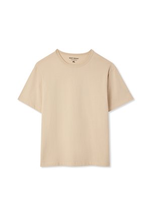 T-shirt beige pesante, maniche corte, scollo rotondo, realizzata in cotone, con design semplice e etichetta "XL" all'interno del colletto.