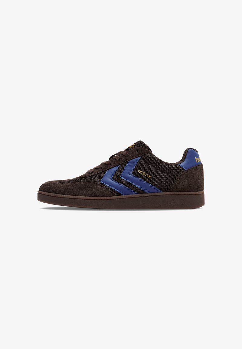 Sneaker with a dark brown suede upper, featuring blue synthetic stripes, mesh detailing, and a brown rubber sole. Gold logo accents present.