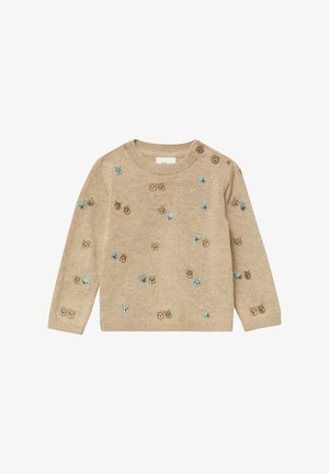 Jasnobeżowy sweter wykonany z miękkiej dzianiny. Ozdobiony różnymi haftowanymi twarzami zwierząt w odcieniach brązu i niebieskiego. Posiada guziki na ramionach ułatwiające zakładanie.