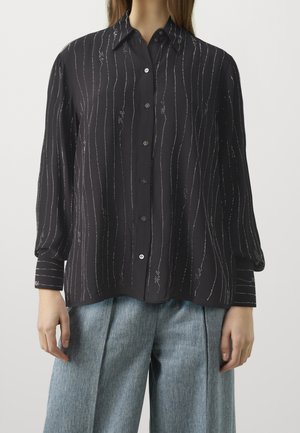 Blusa - black
