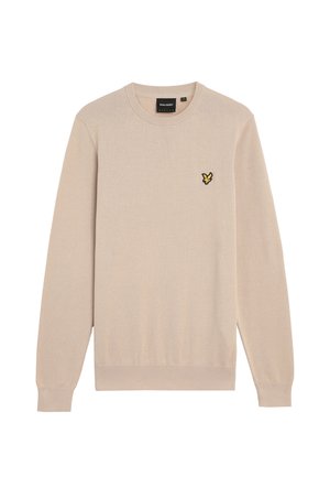 Beige gebreide trui met een ronde halslijn, lange mouwen en geribde manchetten. Heeft een klein zwart en geel vlinderlogo op de borst.