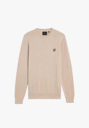 Beige striktrøje med rund halsudskæring, lange ærmer og ribbede manchetter. Har et lille sort og gult sommerfuglelogo på brystet.