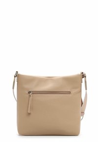 Beige leather crossbody bag with a textured surface, a front zippered pocket, and adjustable strap. Simple, modern rectangular design.