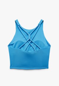 Blå, cropped tanktop med en krydset stropdesign på ryggen og en tætsiddende, sømløs stil.