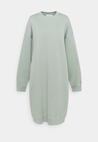 Vaaleanvihreä college-mekko, joka on valmistettu pehmeästä puuvillasta, jossa on pitkät hihat, pyöreä pääntie ja ribattu viimeistely hihansuissa ja helman kohdalla. Yksinkertainen, rento malli.