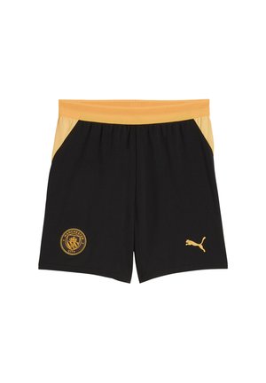 Pantaloncini sportivi neri e dorati con elastico in vita, con il logo del Manchester City sulla gamba sinistra e il logo Puma sulla gamba destra.