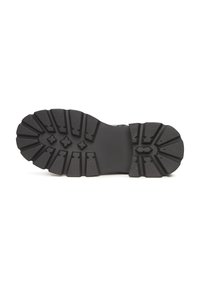 Zwarte rubberen schoenzool met diepe profielen, een textuur oppervlak en een ronde vorm voor verbeterde grip en stabiliteit.