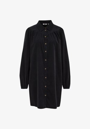 Rochie neagră, cu nasturi, dintr-un material texturat, cu guler, mâneci lungi tip puff și o croială ușor lejeră. Are nasturi aurii.