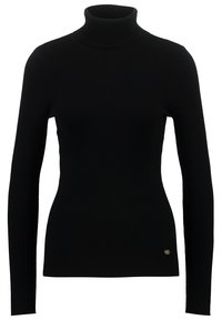 Pull à col roulé noir en maille côtelée à manches longues avec une silhouette ajustée et un petit logo métallique rond près de l'ourlet sur le côté droit.