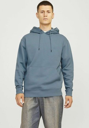 Blauer Baumwollhoodie mit Kängurutasche, Zugkordelkapuze und gerippten Bündchen, der eine weiche Textur und einen lockeren Schnitt bietet.