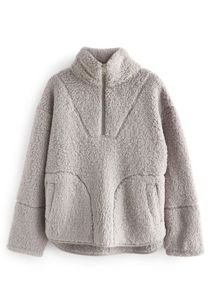 Pull polaire gris clair à manches longues, col montant, demi-fermeture éclair devant et deux poches avant, en tissu sherpa texturé.