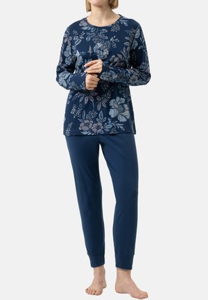 Marinblå blommig långärmad topp med rund halsringning och matchande marinblå byxor. Båda delarna har en mjuk, slät textur och ribbade ärmslut.