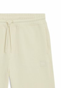 BOSS SEWALK - Pantaloni sportivi - open yellow seventeen