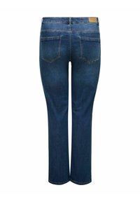 Tumedat sinised denim püksid sirge säärega, kaks tagataskut, peene õmblusega ja nahast silt vöökohtade peal.