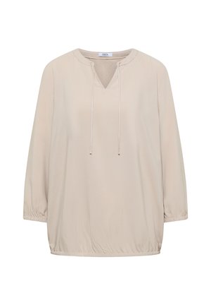 Blouse beige à manches longues avec poignets et ourlet élastiqués, col en V avec cordons à nouer, tissu léger, coupe ample décontractée.