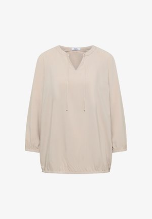 Beigenvärinen pitkähiha pusero, jossa joustavat resorit hihoissa ja helmassa, V-kaula-aukko nyöreillä, kevyt kangas, rento ja löysä istuvuus.