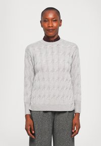 Gray knitted sweater featuring a cable pattern, round neckline, and long sleeves, paired with gray textured pants.