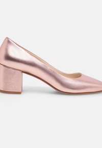 Rose gold metallic block-heel pump with a pointed toe and smooth texture, featuring a chunky heel and a shiny finish.
