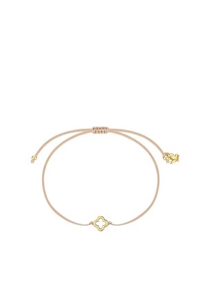 Justerbar beige snorarmbånd med en lille guldfarvet firkløver ved midten og guldfarvede perler ved enderne.