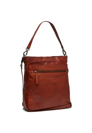 Leder-Schultertasche in tiefem Rostton mit einem Reißverschlussfach auf der Vorderseite und einem verstellbaren Schulterriemen. Glatte Textur mit minimalistischem Design.