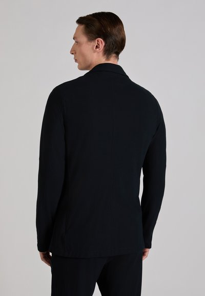 Black long-sleeve jacket with a smooth texture, fitted shape, and minimal detailing. Features a notch lapel and single vent at the back.