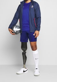 Nike Performance Urheilushortsit - blue