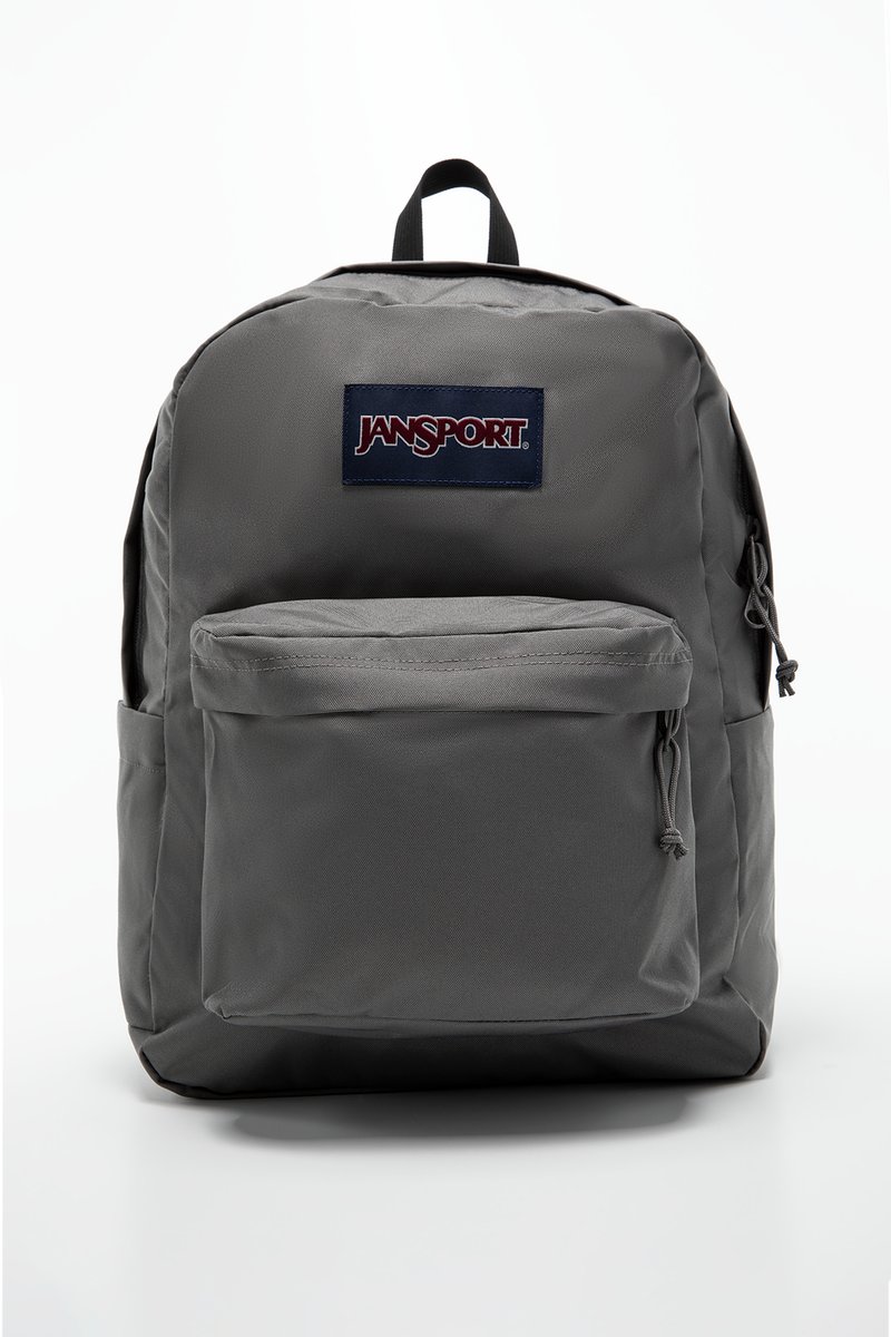 Sac à dos Jansport gris avec une poche avant, des bretelles réglables et une poignée de transport en haut. Fabriqué en tissu durable avec une texture lisse.