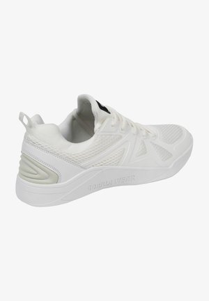 White athletic shoe with mesh upper, textured accents, and rubber sole. Features reinforced heel and logo detail on tongue.