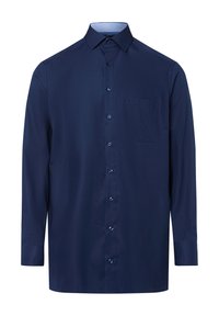 Camicia a maniche lunghe blu navy realizzata in tessuto morbido, con chiusura a bottoni, colletto e una tasca sul petto. Dettagli a contrasto all'interno del colletto.