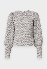 Μπλούζα μακρύ μανίκι με ραμμένα μανίκια και φουσκωτούς ώμους σε υφή γκρι και λευκού, διαθέτοντας εφαρμοστά μανίκια και στρογγυλή λαιμόκοψη.