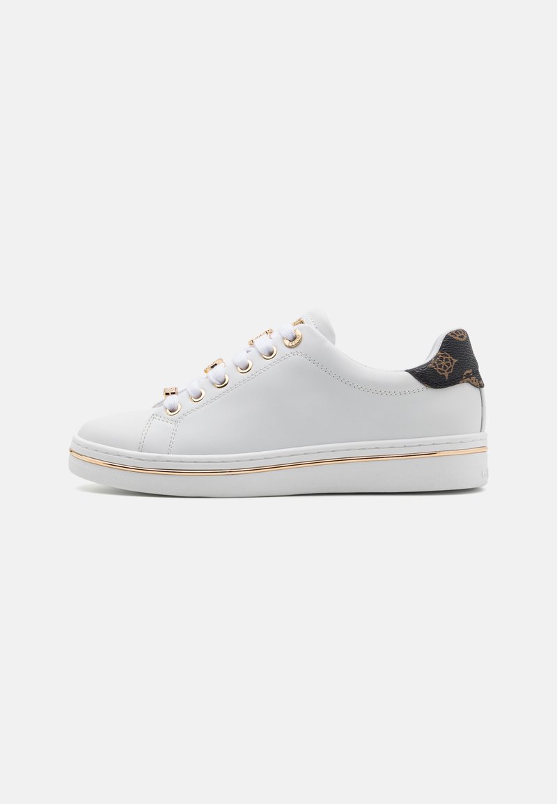 White leather sneaker with gold-tone eyelets, a textured black heel accent, and a thick white sole with a subtle gold stripe.